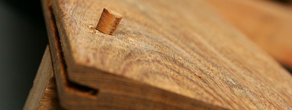 Smooth Hardwood Plug being installed into deck board